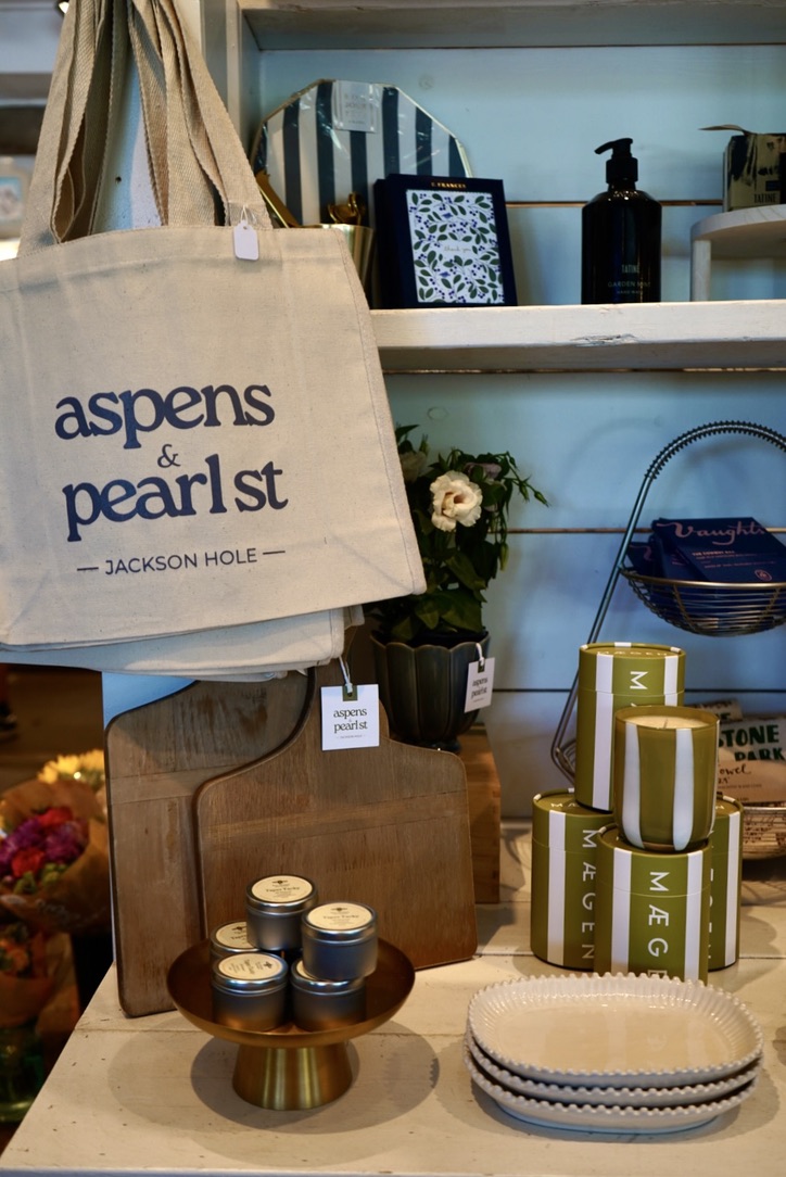 Aspens & Pearl St logo printed on a canvas tote bag